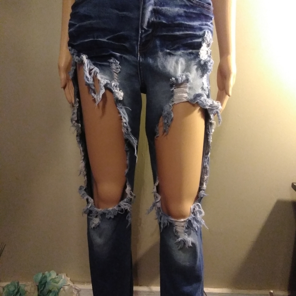Jeans with large holes